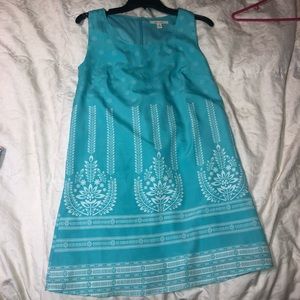 a blue and white dress